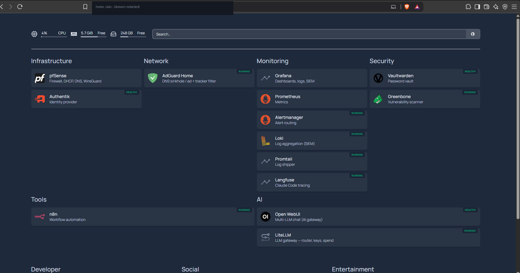 The lab&rsquo;s Homepage dashboard, AdGuard sitting in the Network group next to pfSense
